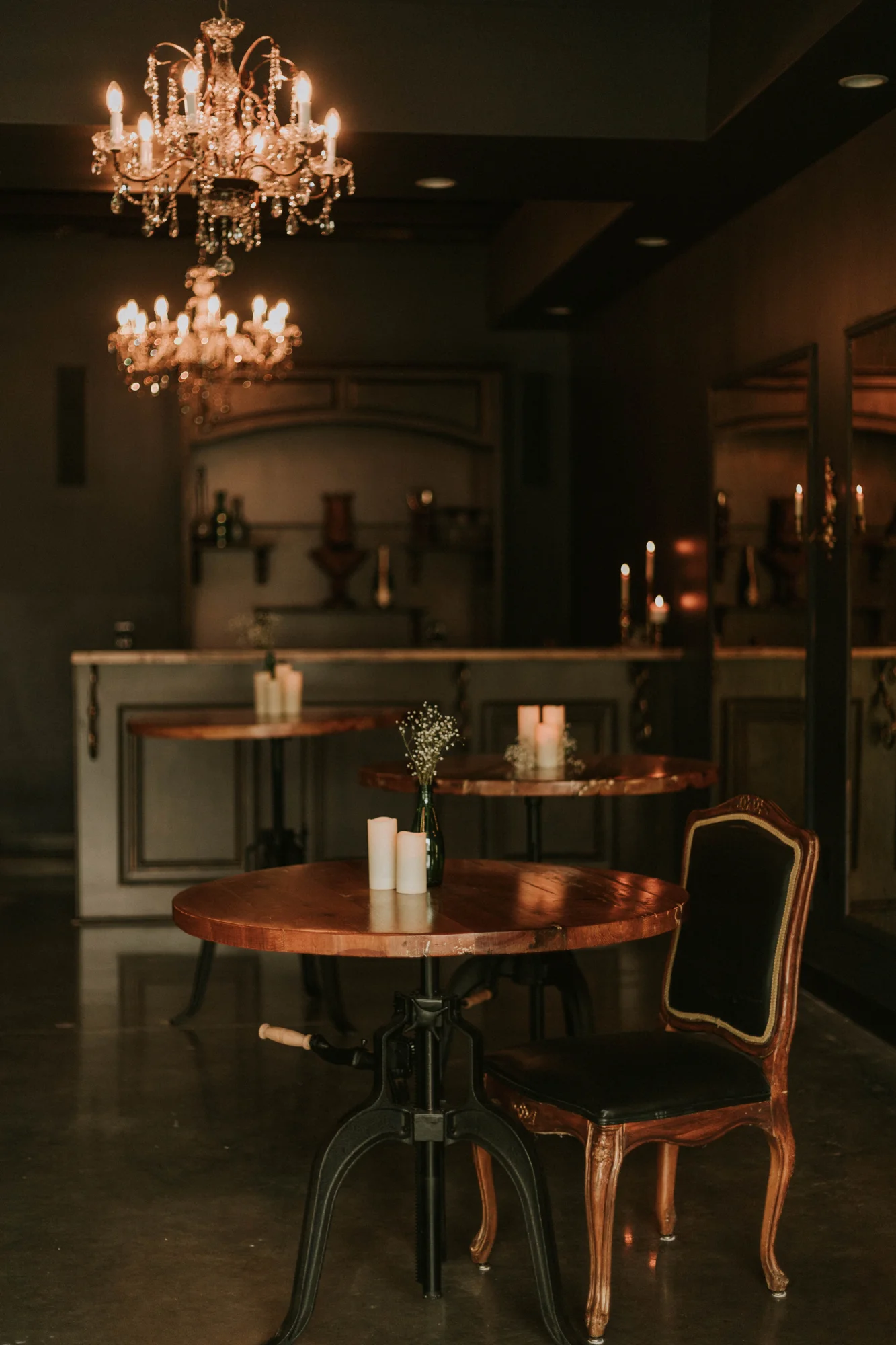 A welcoming table with vintage chairs in the Parlour